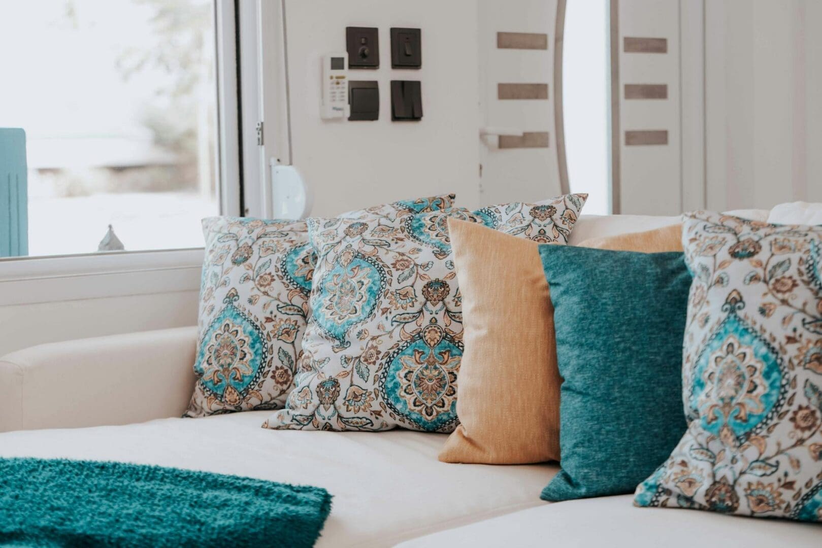 How to Style a Neutral Sofa with Color
